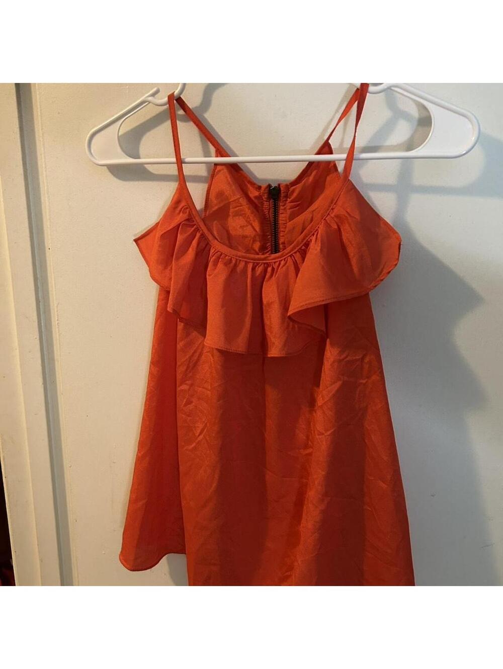 Charlotte Russe orange top with ruffled neckline and zipper back size M